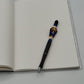 Grumpy Creature in Blue Beaded Refillable Metal Pen